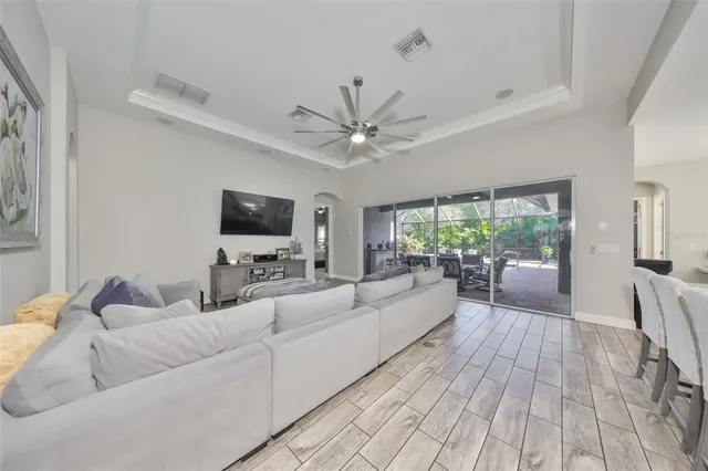 a spacious bedroom with a large bed and a window