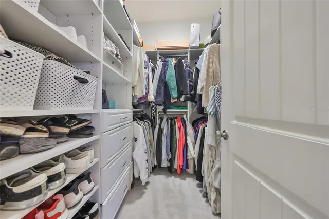 a view of a backyard with a patio and plants