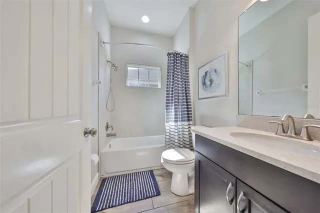 a view of yard with patio