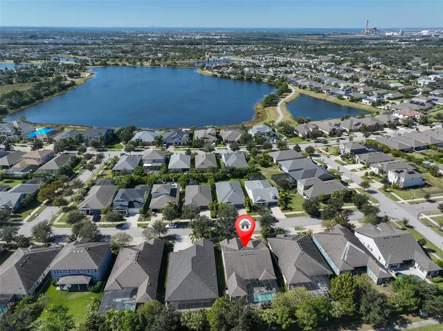 a view of a park with a slide and table
