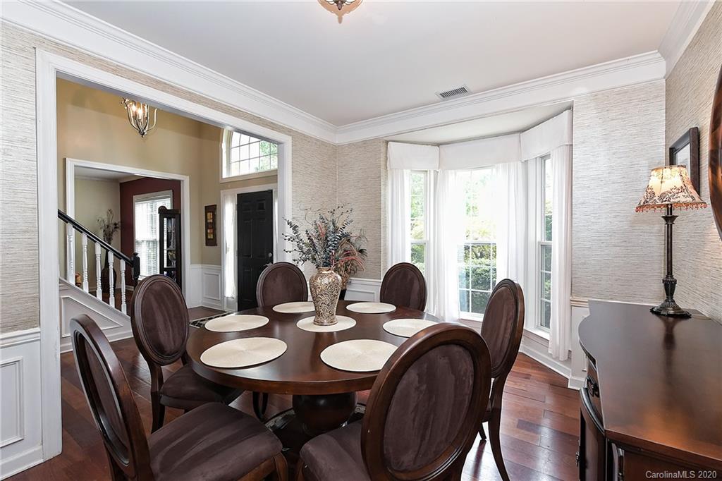 331 Matthews Estates Road Matthews, NC 28105 - Photo 6 of 32 a view of a dining room with furniture window and wooden floor