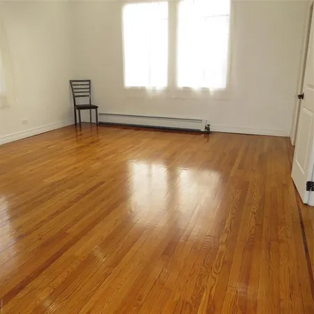 a bathroom with a bathtub and a sink