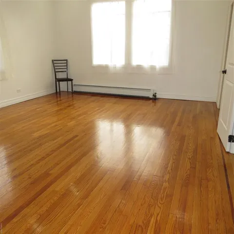 a bathroom with a bathtub and a sink