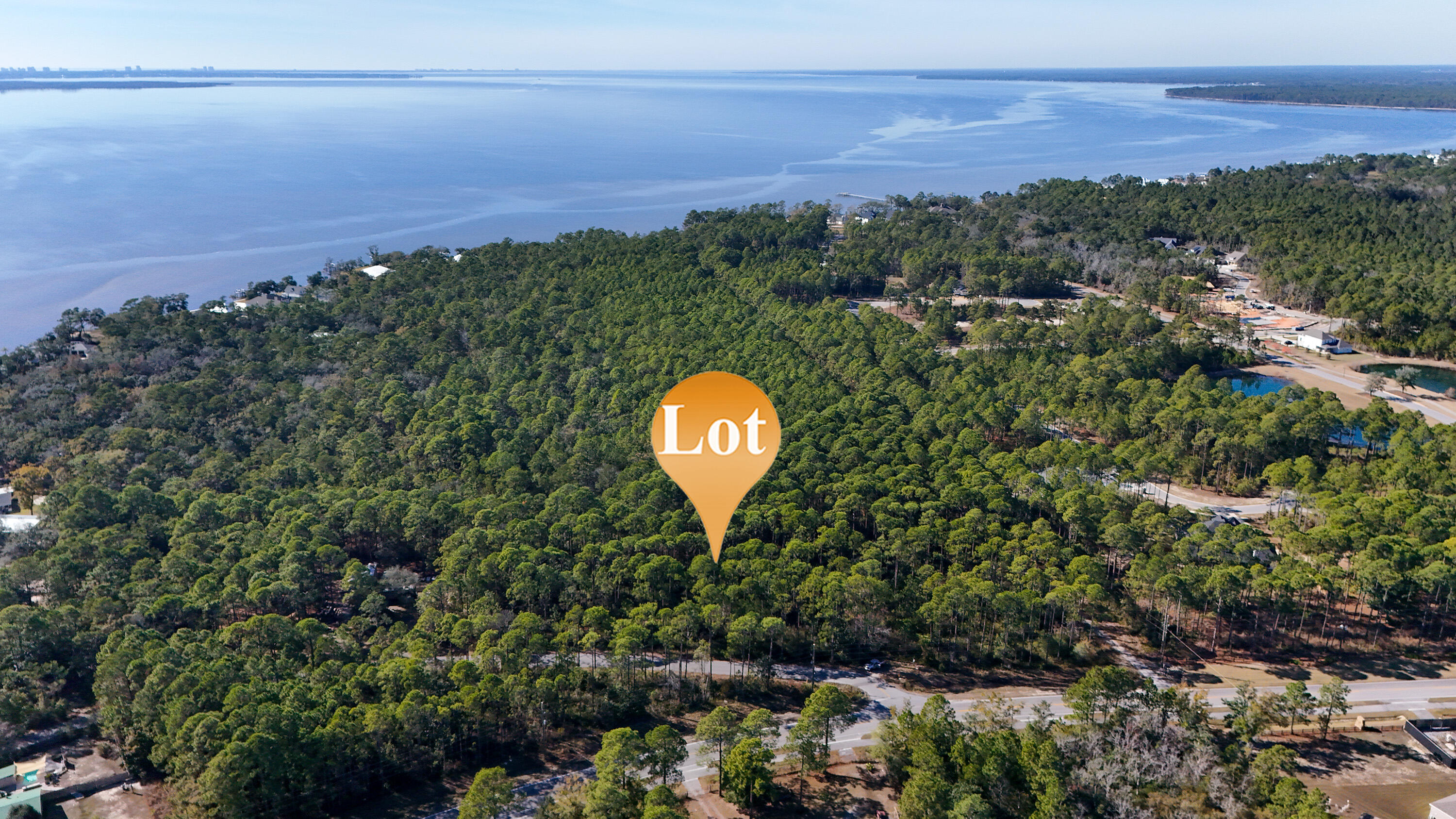 1.9-acres Red Barn Road Freeport, FL 32439 - Photo 5 of 11 a view of a yard in front of a building with a garden