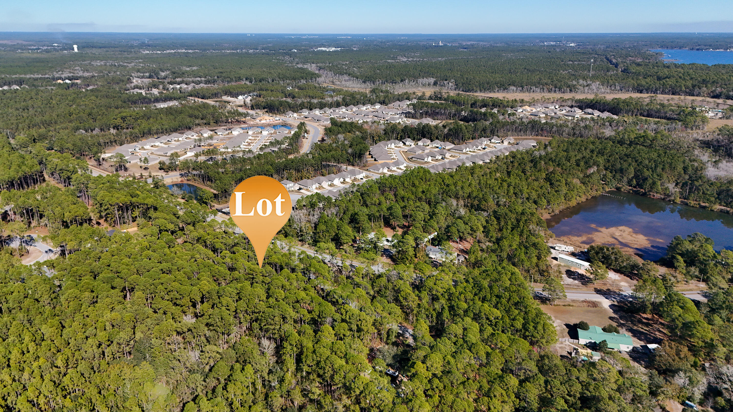 1.9-acres Red Barn Road Freeport, FL 32439 - Photo 7 of 11 an aerial view of multiple house