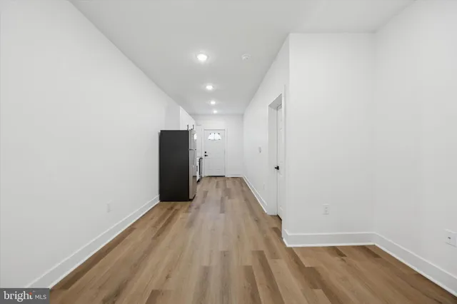 a view of a big room with wooden floor