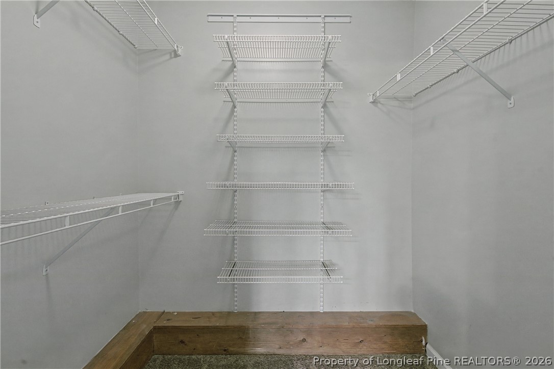 212 Finch Road Fayetteville, NC 28306 - Photo 25 of 50 Walk-in closet, primary suite.