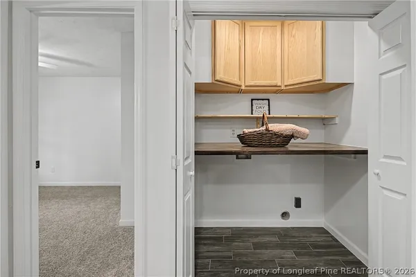 a view of an empty room and window