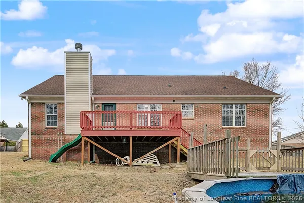 a view of a house with a roof deck