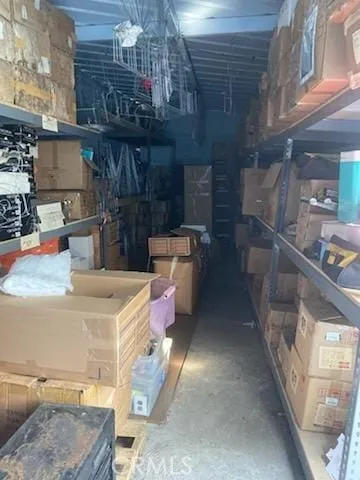 a bathroom with a toilet a sink and a mirror