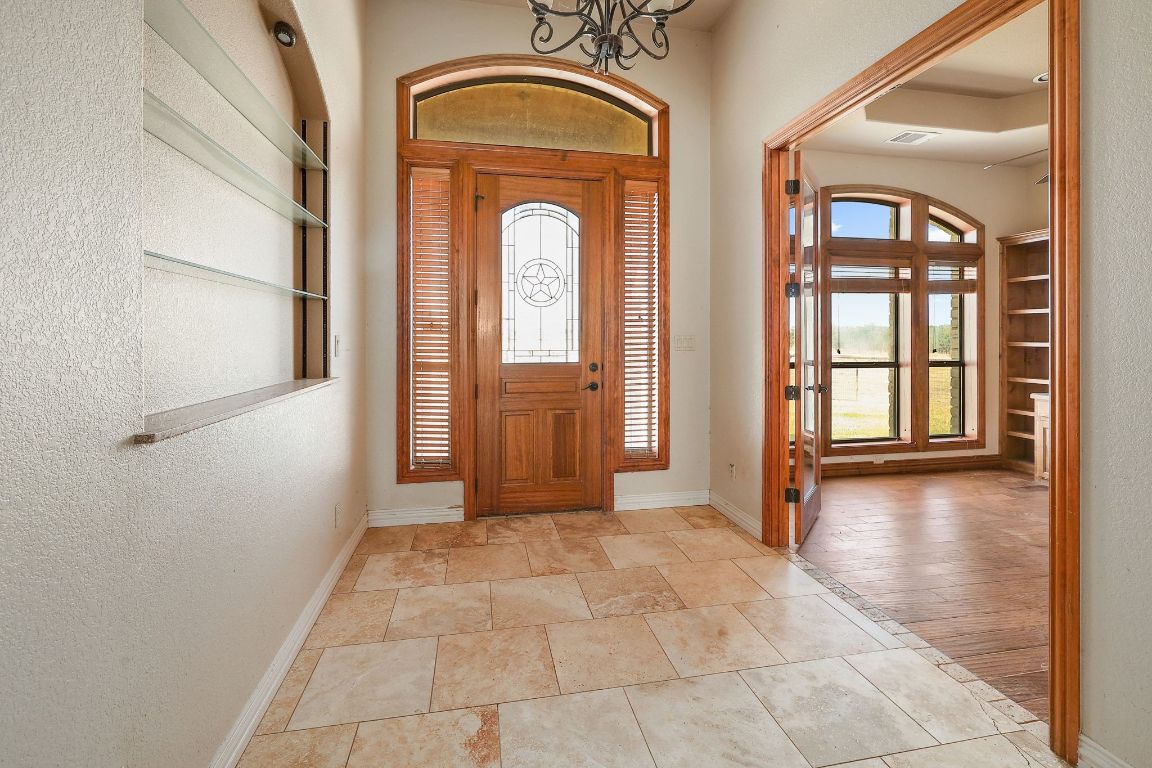 22300 Farm To Market Road 971 Granger, TX 76530 - Photo 15 of 37 a view of a entryway with wooden floor