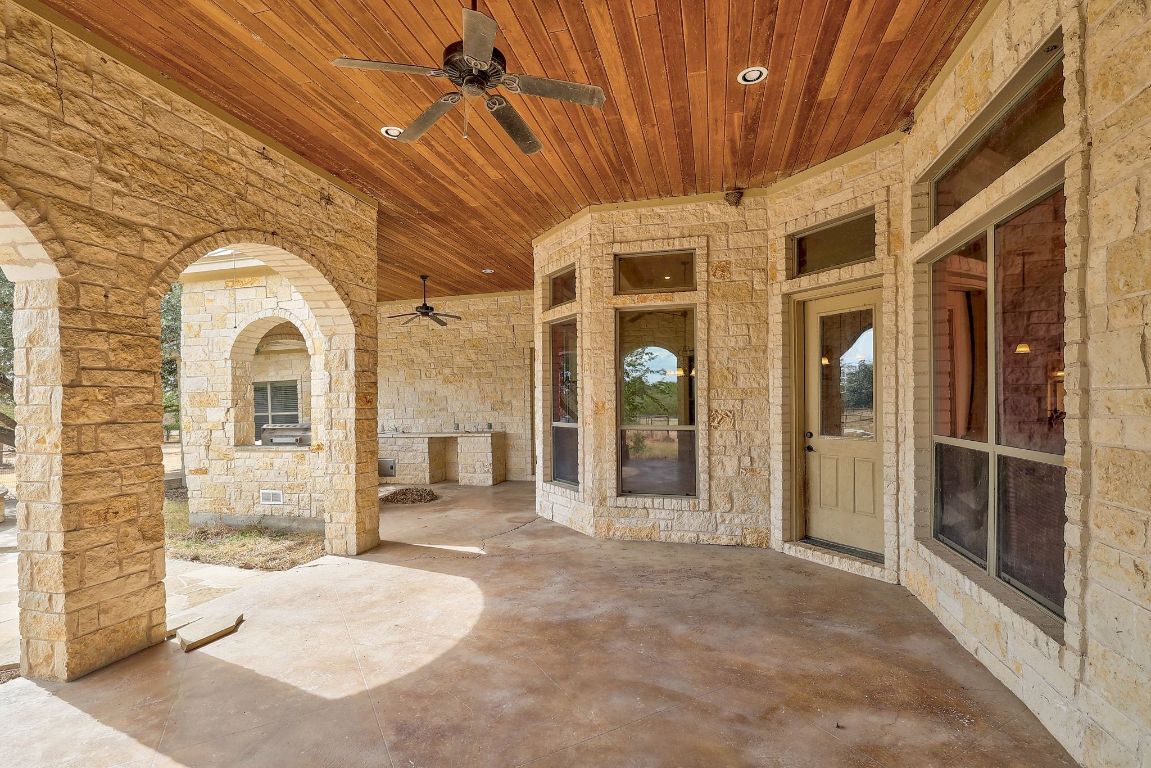 22300 Farm To Market Road 971 Granger, TX 76530 - Photo 29 of 37 a view of a hallway with brick walls