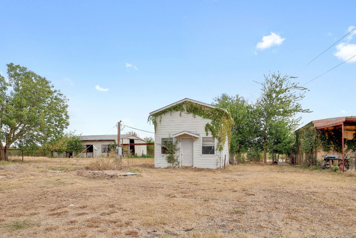 22300 Farm To Market Road 971 Granger, TX 76530 - Photo 36 of 37 a view of a house with a yard and sitting area