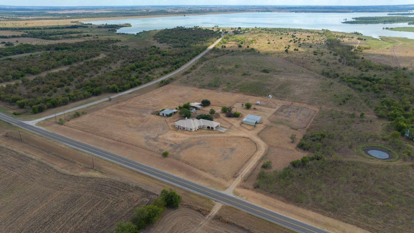 22300 Farm To Market Road 971 Granger, TX 76530 - Photo 6 of 37 a view of a room with a floor to ceiling window