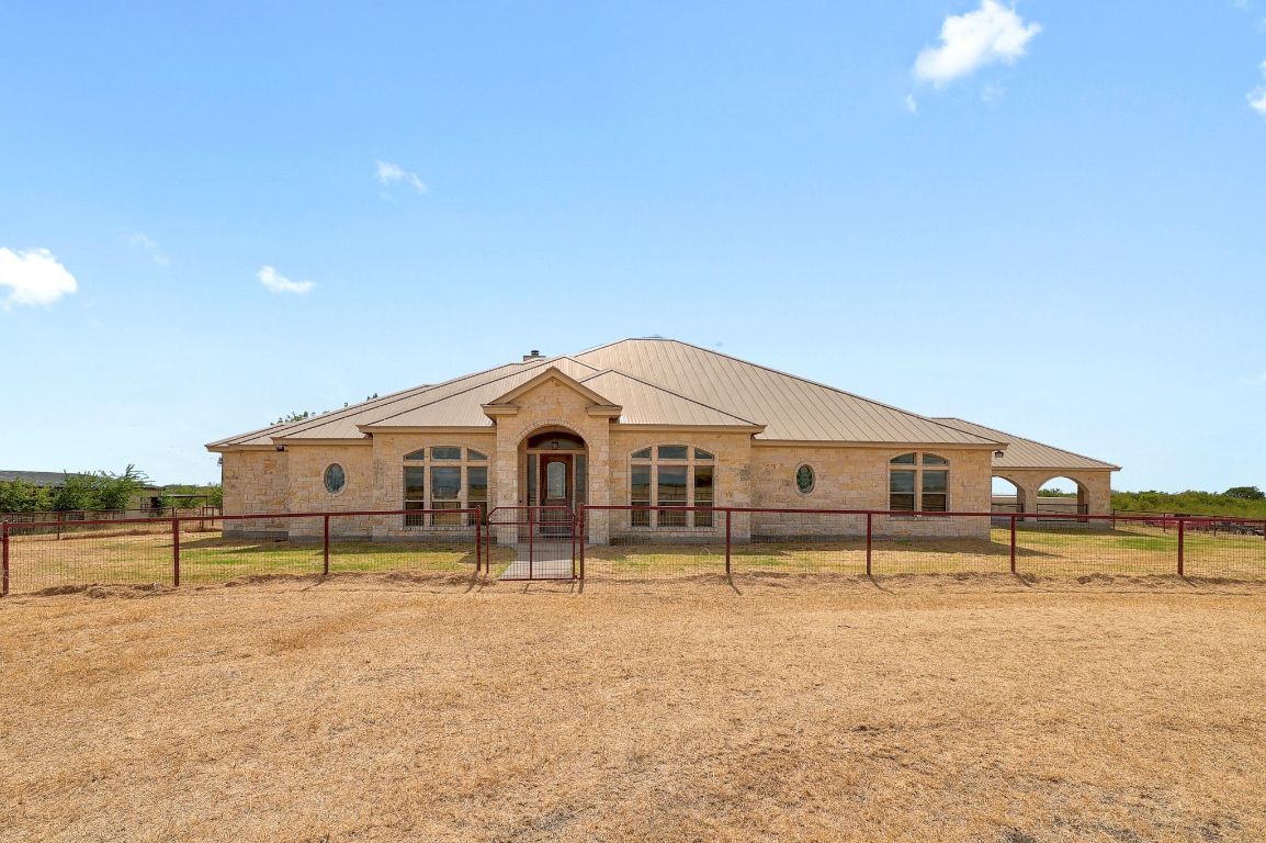22300 Farm To Market Road 971 Granger, TX 76530 - Photo 8 of 37 a front view of a house with a yard