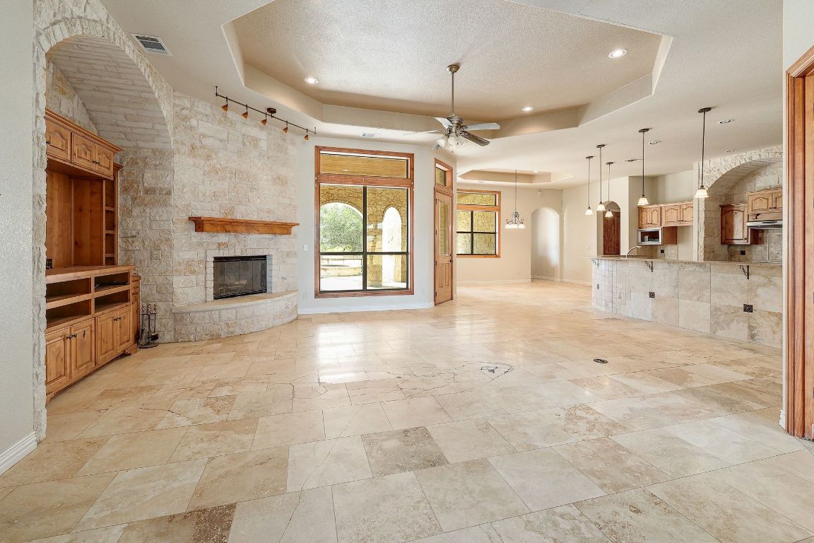 22300 Farm To Market Road 971 Granger, TX 76530 - Photo 9 of 37 a view of a kitchen with a sink and a stove top oven