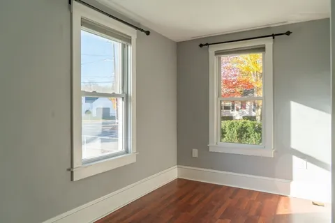 a bathroom with a sink a toilet and a shower