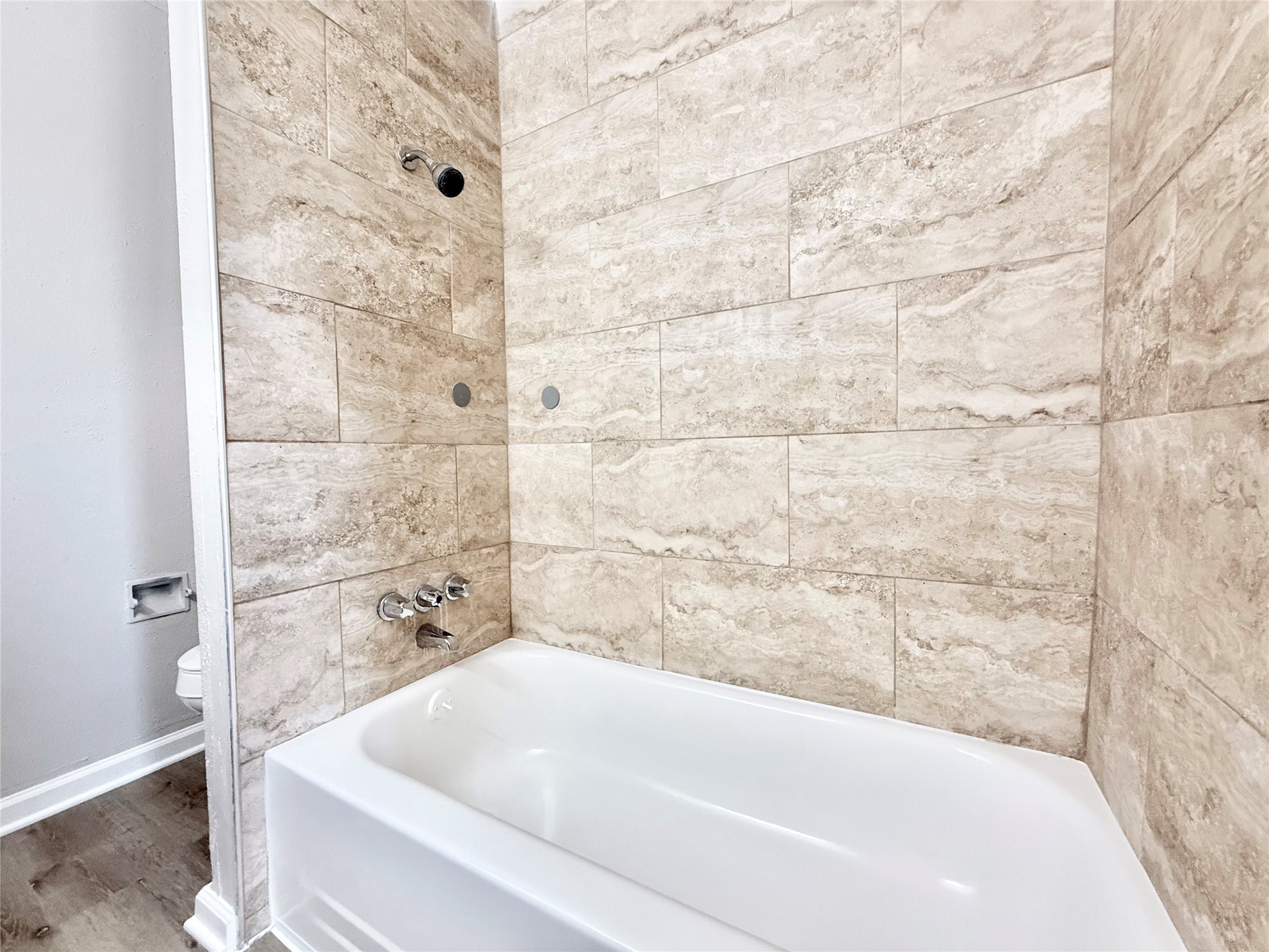 7980 Grove Ridge Drive Houston, TX 77061 - Photo 16 of 19 Full tile surround in the tub/shower combo