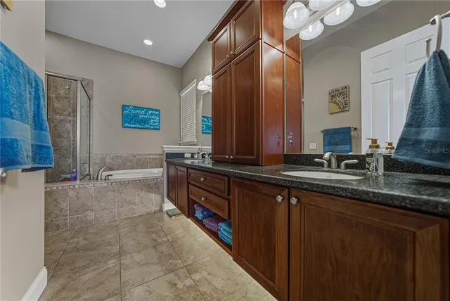 a front view of house with yard and outdoor seating