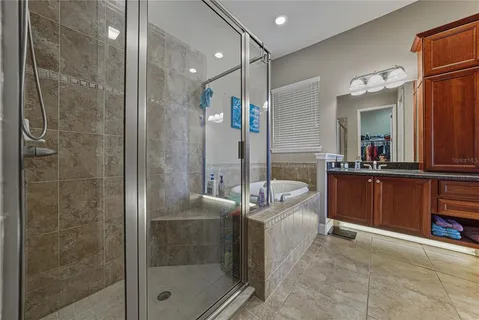 an aerial view of a house with a garden