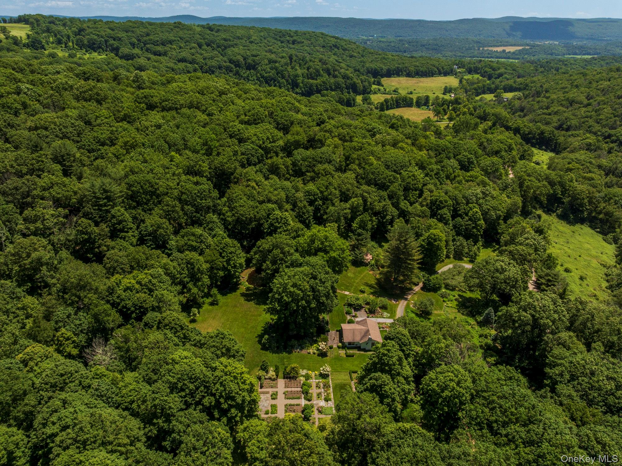 447 Butts Hollow Road Dover Plains, NY 12522 - Photo 2 of 27 an aerial view of a houses with a yard