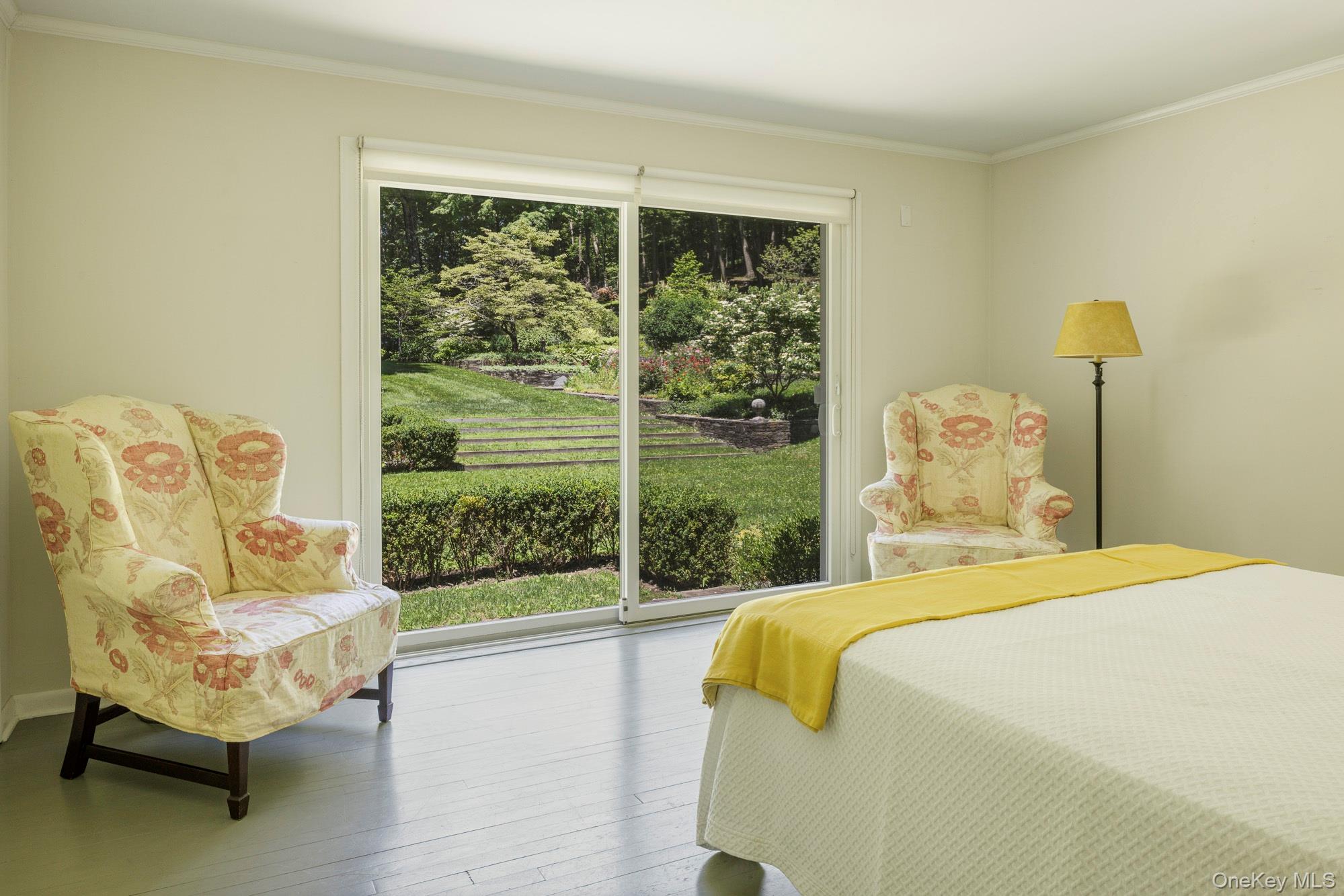 447 Butts Hollow Road Dover Plains, NY 12522 - Photo 24 of 27 a bedroom with a bed and glass window