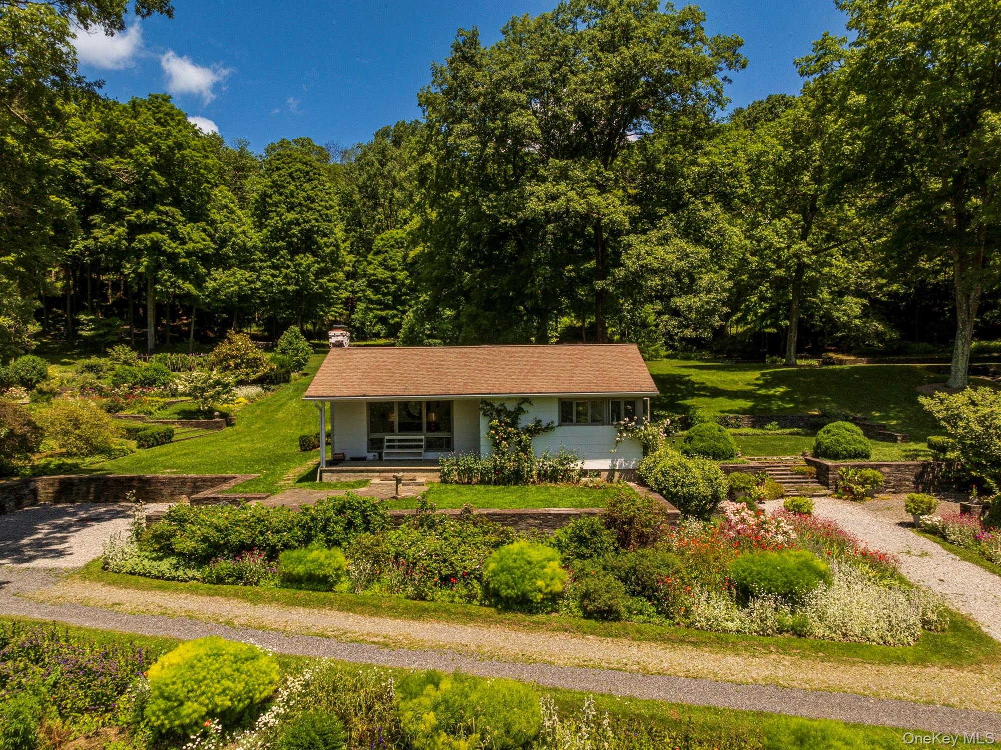 447 Butts Hollow Road Dover Plains, NY 12522 - Photo 26 of 27 a front view of house with yard and green space