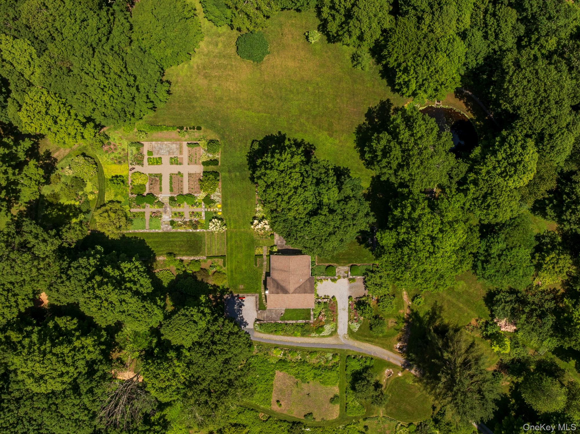 447 Butts Hollow Road Dover Plains, NY 12522 - Photo 27 of 27 an aerial view of a house with a yard