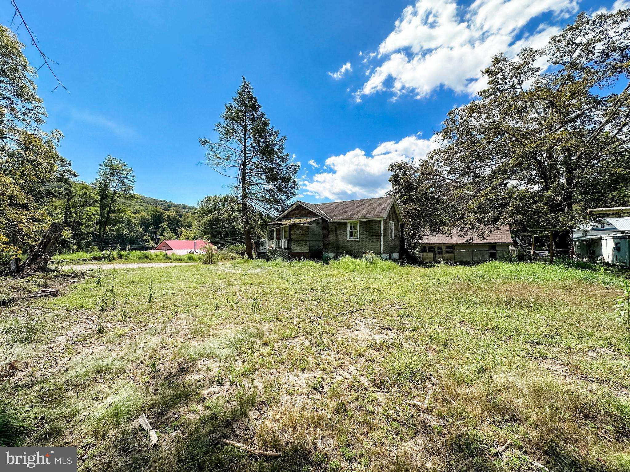 13204 Barrelville Road Northwest Mount Savage, MD 21545 - Photo 28 of 35 a view of a house with a yard