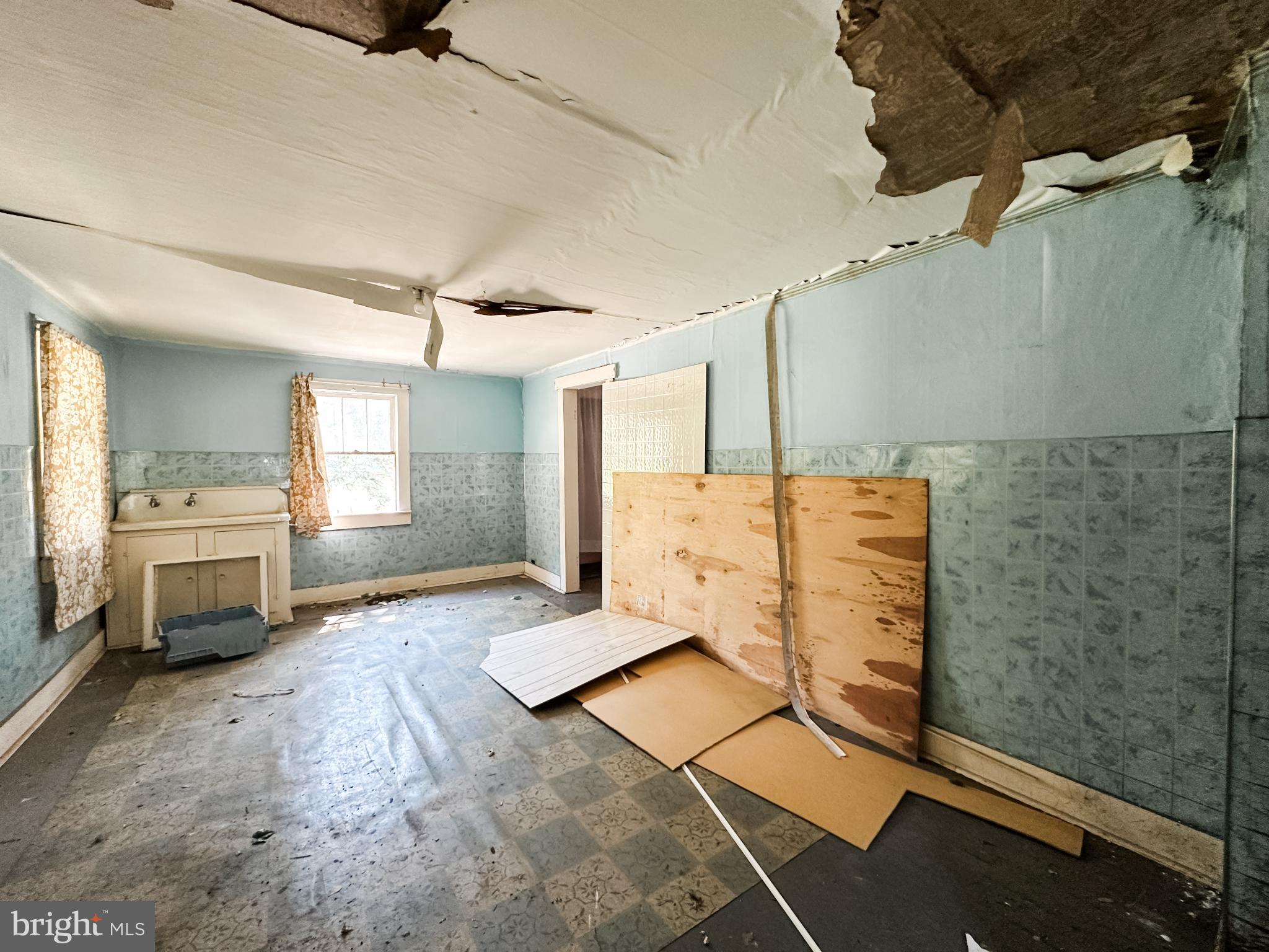 13204 Barrelville Road Northwest Mount Savage, MD 21545 - Photo 32 of 35 a bathroom with a sink and a shower