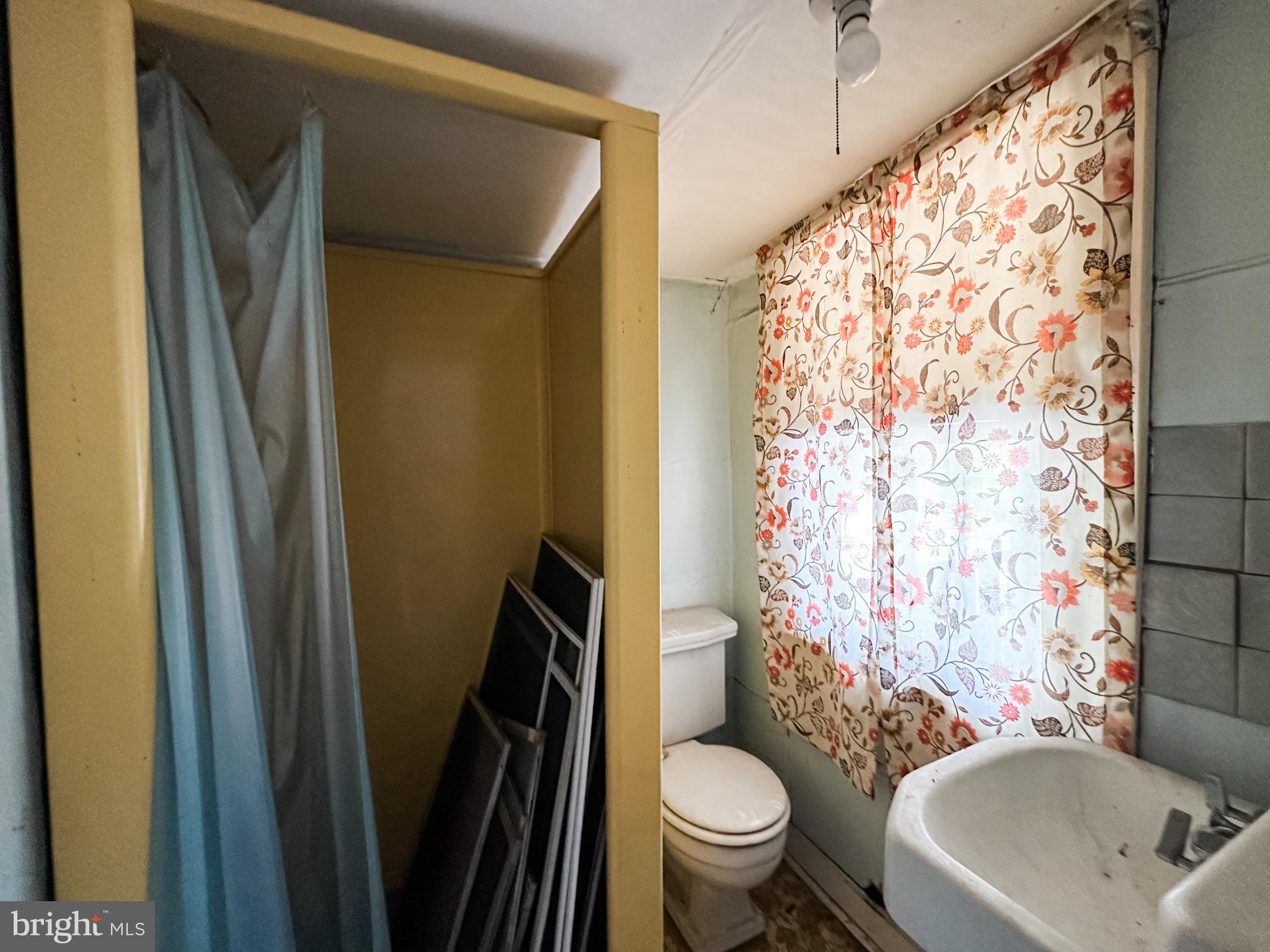 13204 Barrelville Road Northwest Mount Savage, MD 21545 - Photo 34 of 35 a bathroom with a sink toilet and shower