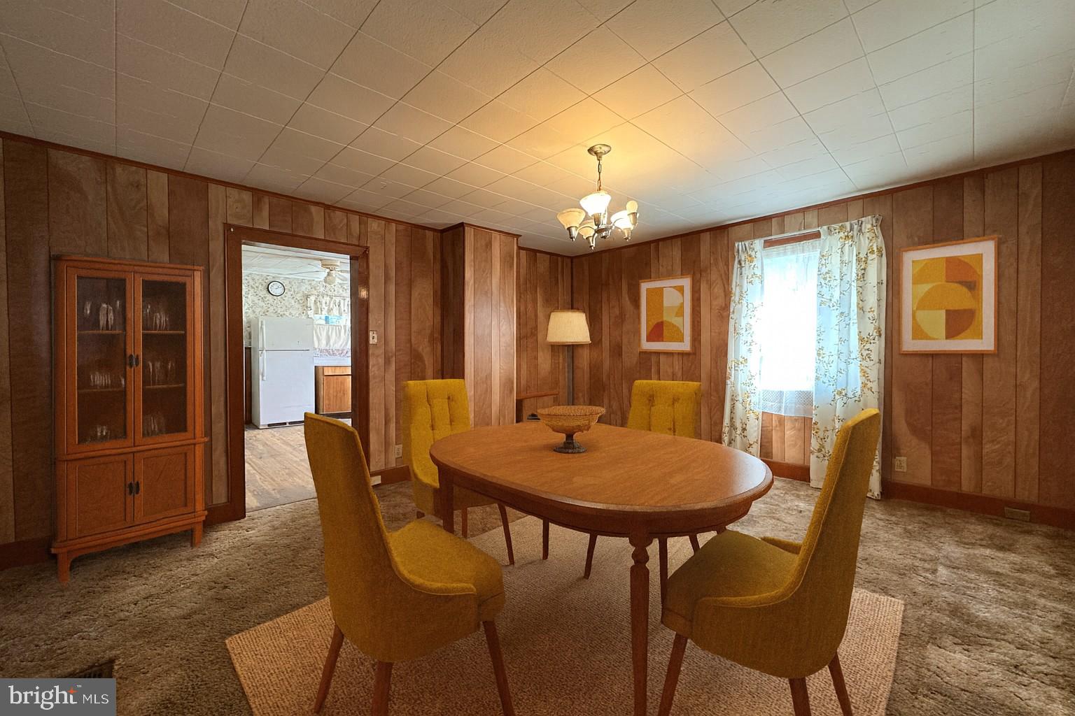 13204 Barrelville Road Northwest Mount Savage, MD 21545 - Photo 5 of 35 a view of a dining room with furniture window and wooden floor