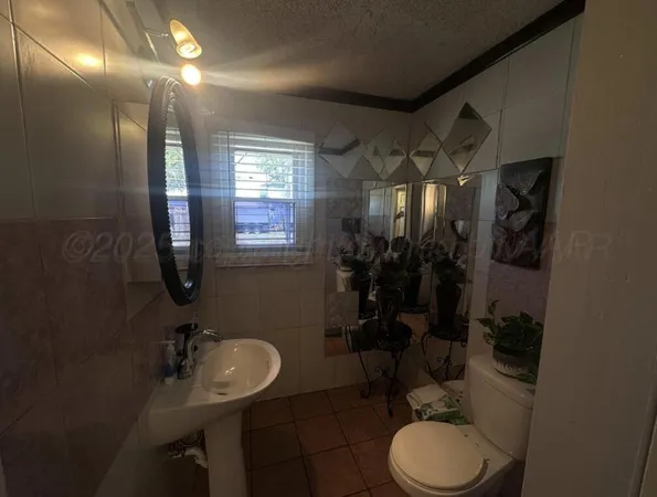 a room with painting and a table