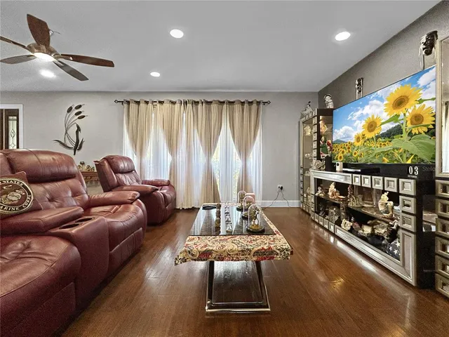 a bed room with furniture and a window