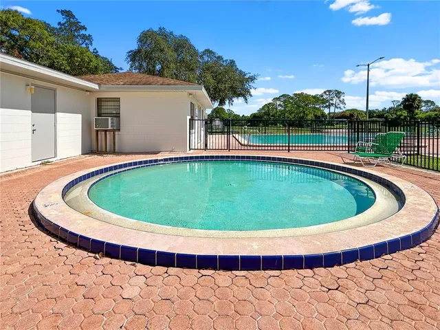 a view of a lake with a big yard