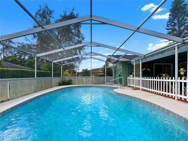 a view of a backyard with porch