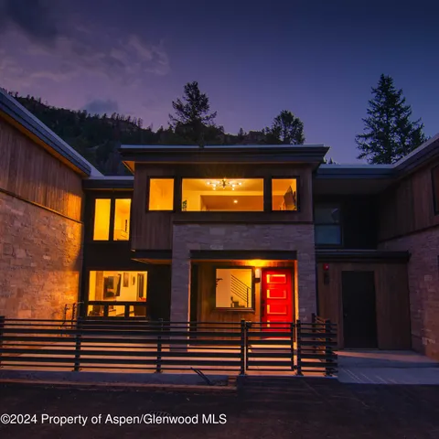 a view of a living room and entryway