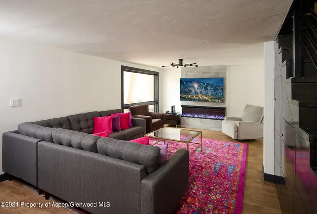 a living room with furniture and a couch