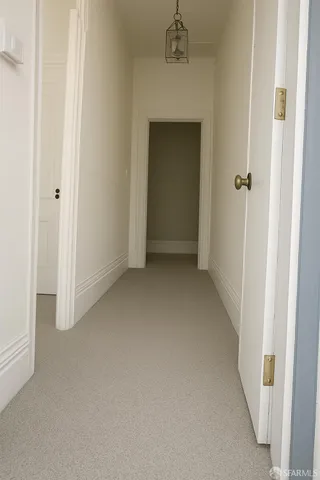 a view of a room with a wardrobe space