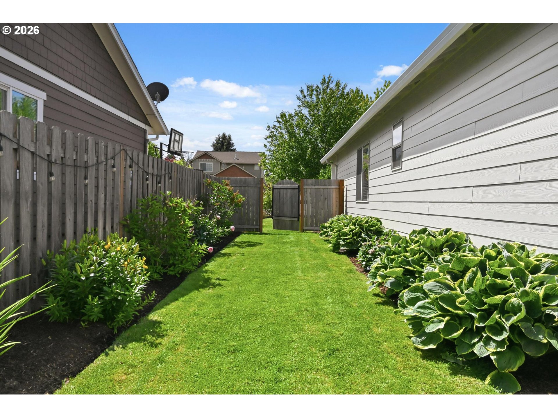 1075 Sage Street Silverton, OR 97381 - Photo 45 of 46 a view of a backyard with plants