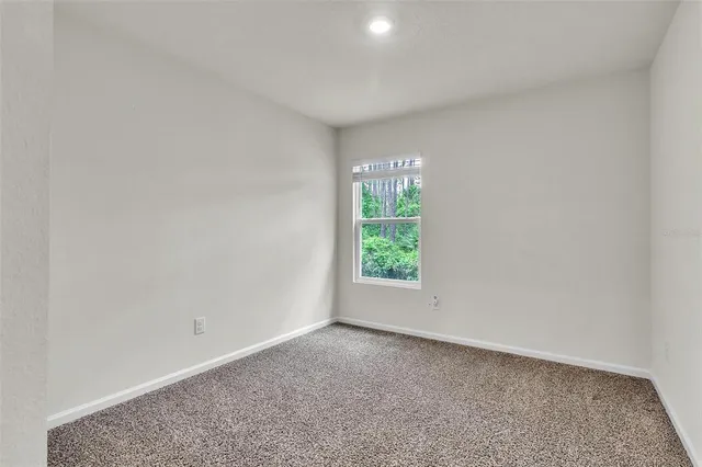 a view of a house with a swimming pool