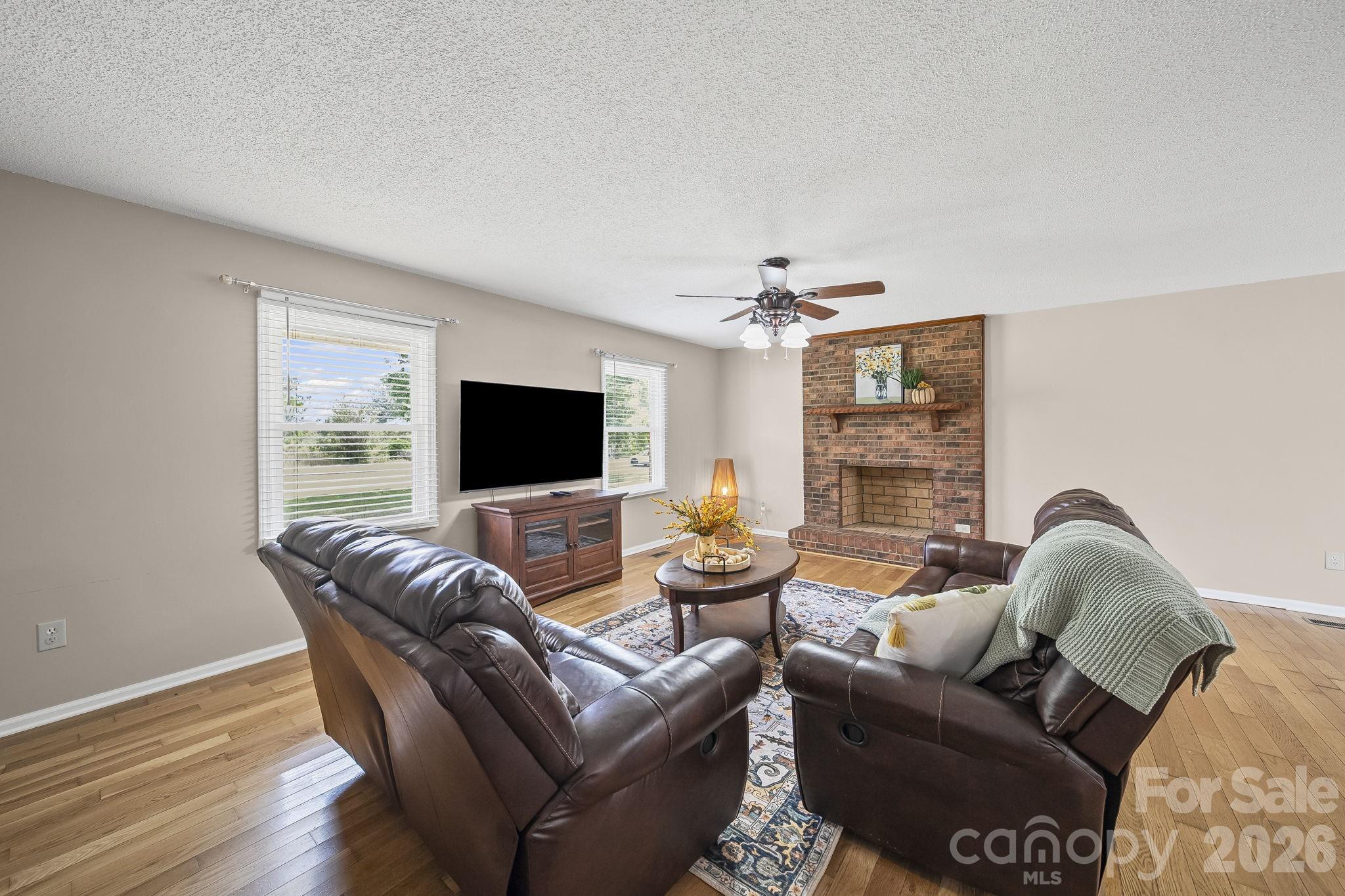 1090 Davids Chapel Church Road Vale, NC 28168 - Photo 20 of 35 a living room with furniture or couch and a flat screen tv