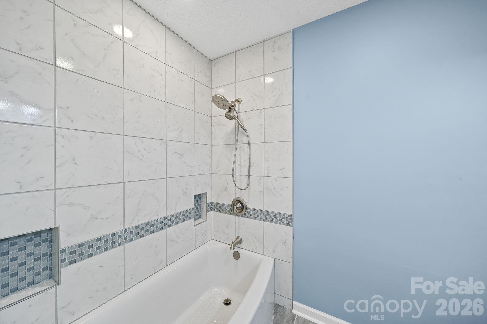 1090 Davids Chapel Church Road Vale, NC 28168 - Photo 28 of 35 a bathroom with a bathtub