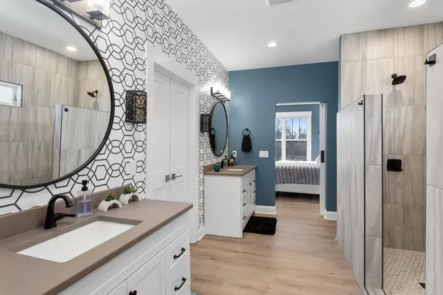 a bathroom with a sink and a mirror