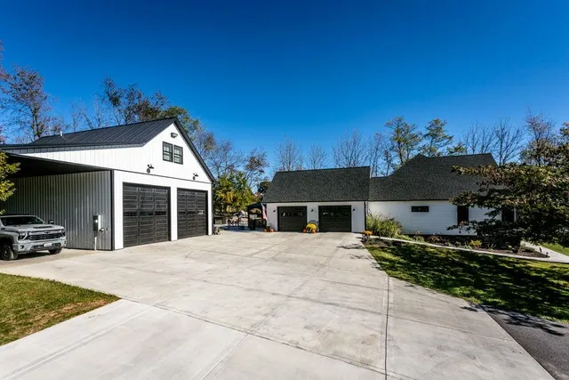 a view of a park with large trees