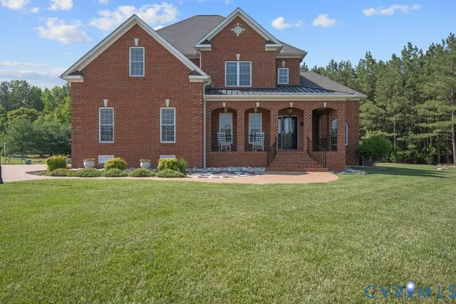 a front view of house with yard