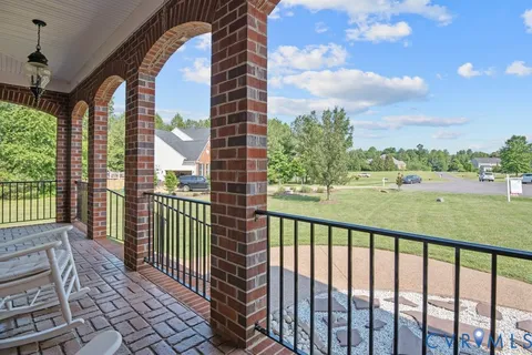 a view of a brick house with a door