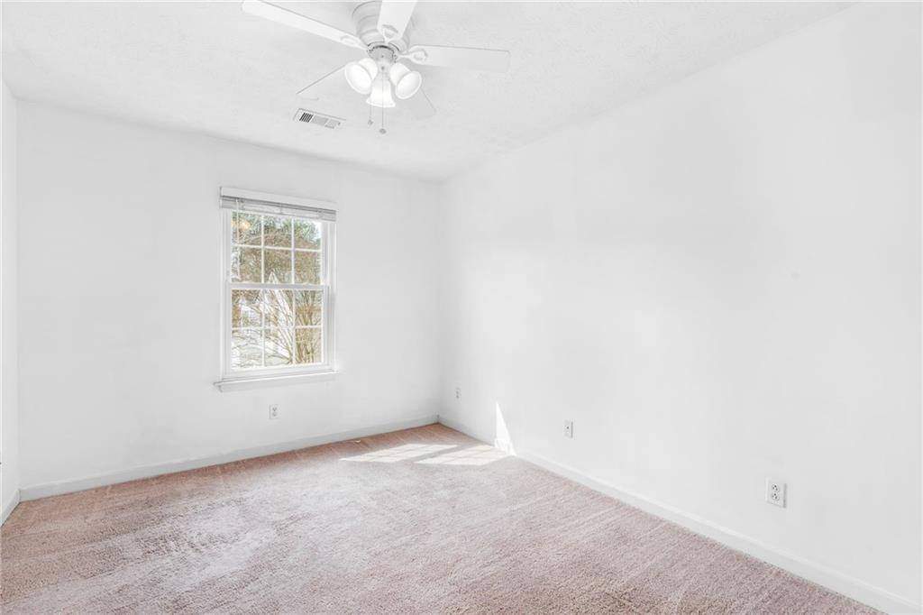 562 Windcroft Circle Northwest Acworth, GA 30101 - Photo 14 of 25 an empty room with a window