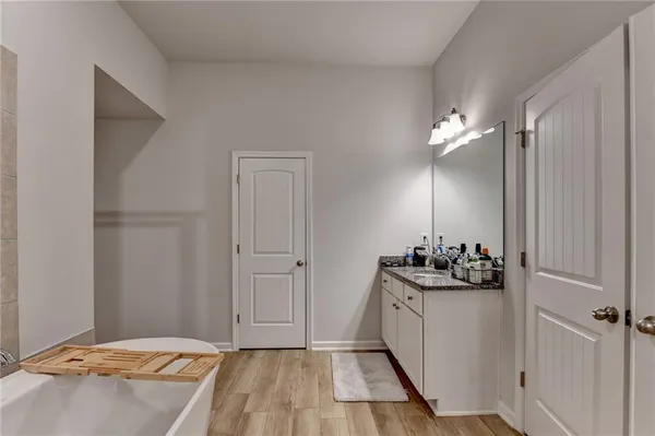 a view of a bedroom with a baby crib