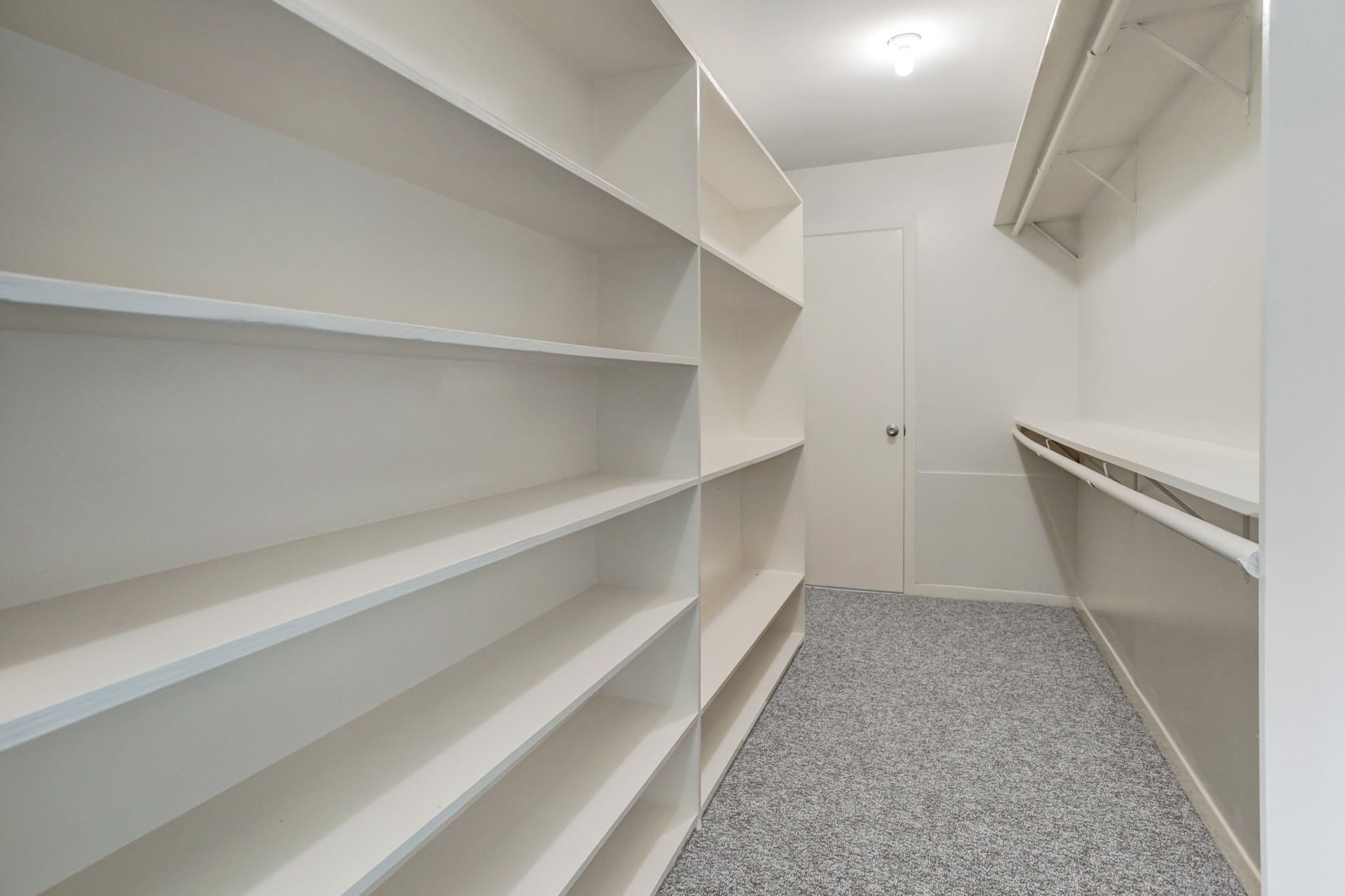 10226 Ivyridge Road Houston, TX 77043 - Photo 15 of 37 a view of an empty walk in closet